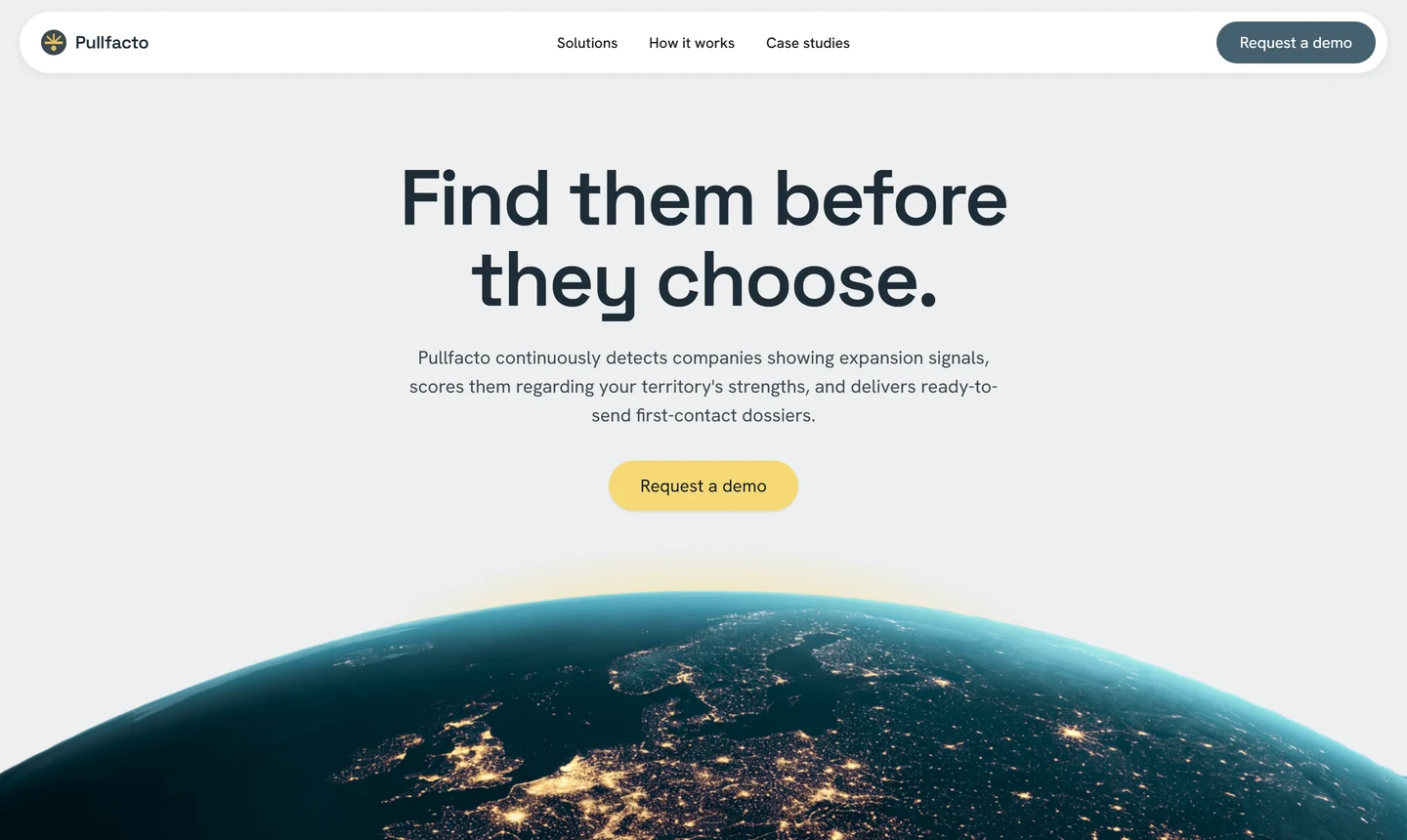 Pullfacto's landing page: the headline "Find them before they choose", a short description of the product and a "Request a demo" button, over a photograph of Europe lit up at night from orbit.